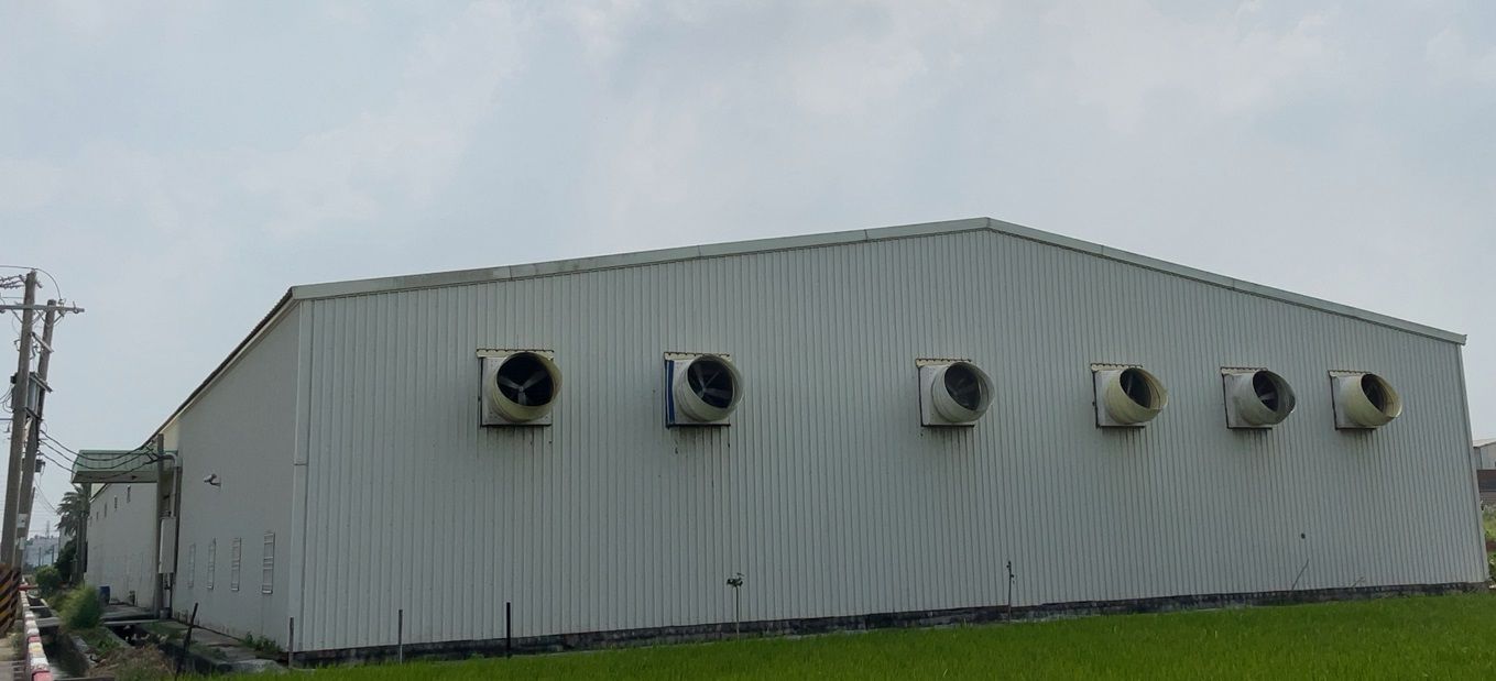Air extractor fans on the factory sides to circulate air and reduce temperature inside the production sites